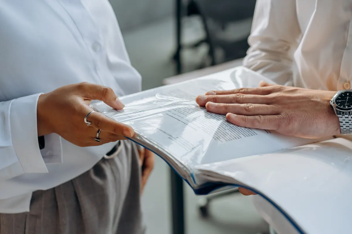 Business documents prepared on an office table