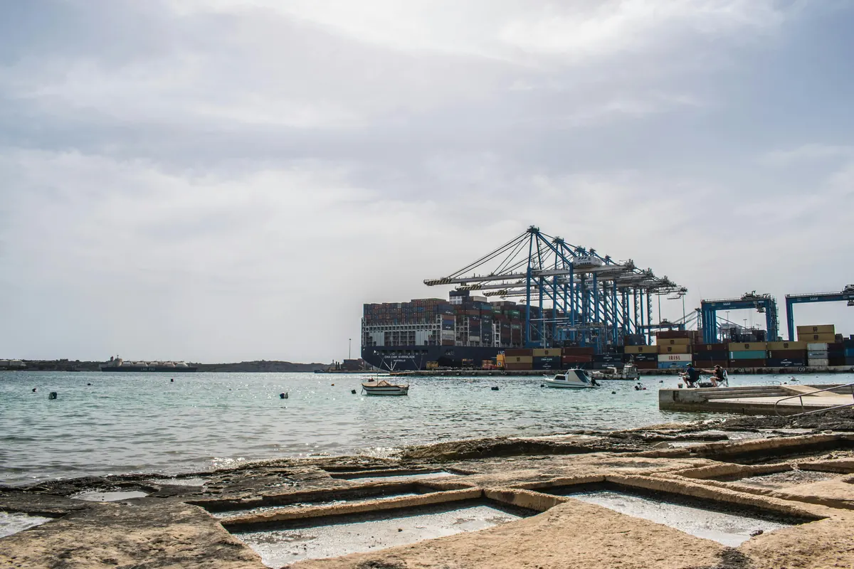 Freight containers and cranes at a commercial port